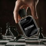 Inferno 55ml Extrait de Parfum on a chessboard
